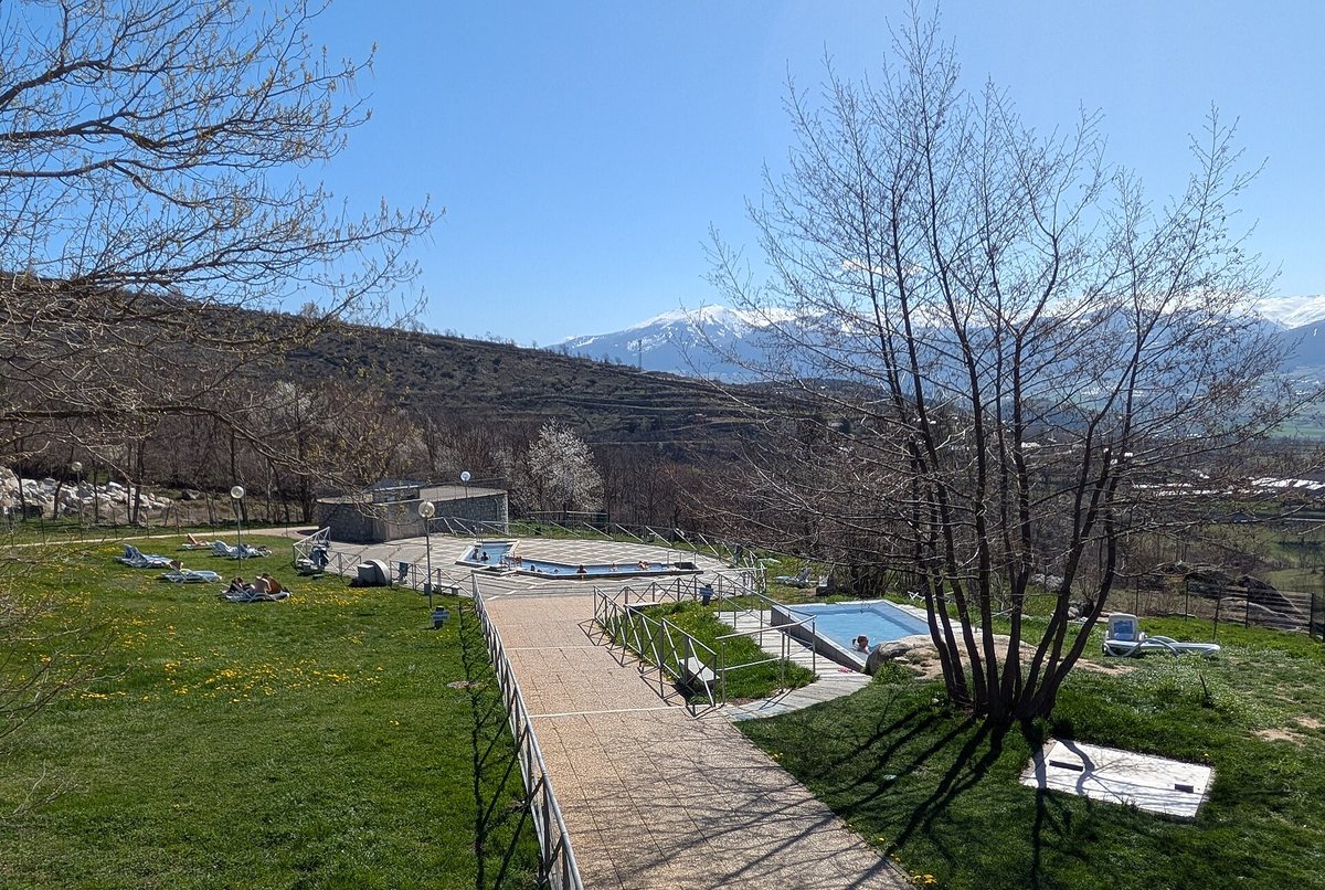 The hot-water pools at the Dorres baths, with the valley beyond