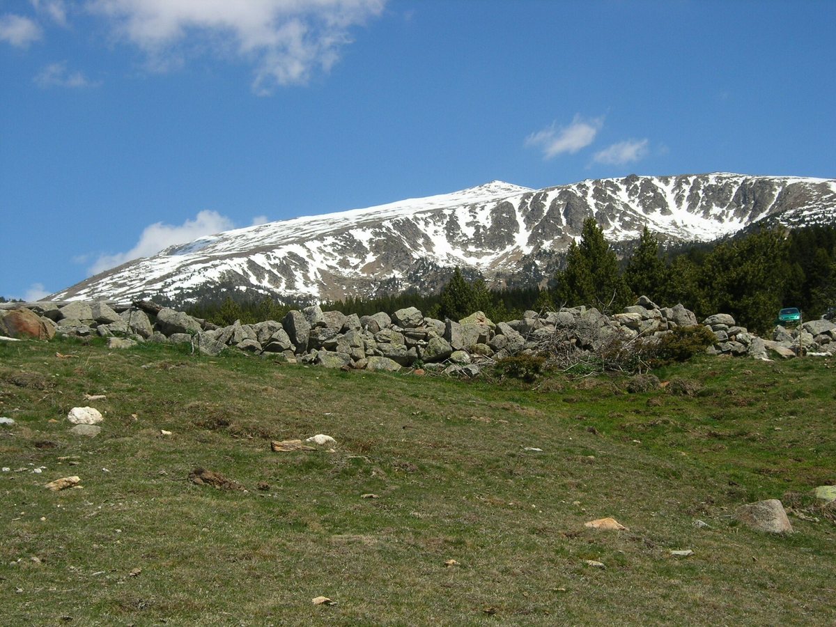 The snow-capped Tossa Plana de Lles from Cap del Rec